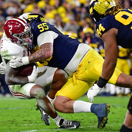 Mason Graham (55) and Kris Jenkins (94)