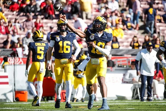 Karmello English (5), Davis Warren (16), and Alex Orji (10)
