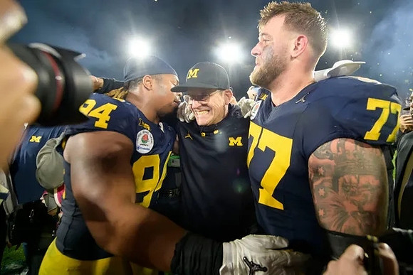 Kris Jenkins (94), Jim Harbaugh, and Trevor Keegan (77)