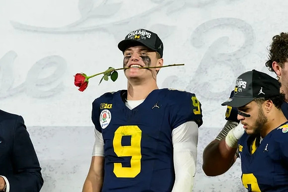 J.J. McCarthy (9) and Blake Corum (2)