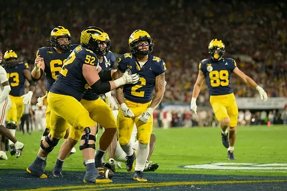 LaDarius Henderson (73), Drake Nugent (60), Karsen Barnhart (52), Blake Corum (2), and AJ Barner (89)