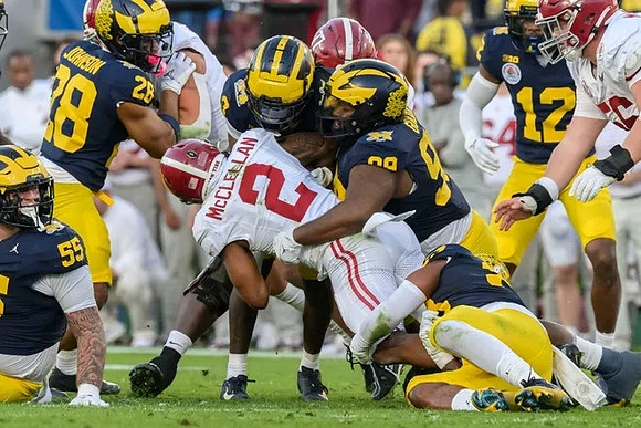 Mason Graham (55), Quinten Johnson (28), Keon Sabb (3), Cam Goode (99), and Josh Wallace (12)
