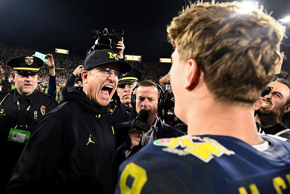 Jim Harbaugh and J.J. McCarthy (9)