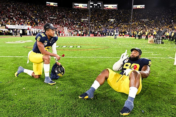 Cornelius Johnson (6) and Cam Goode (99)