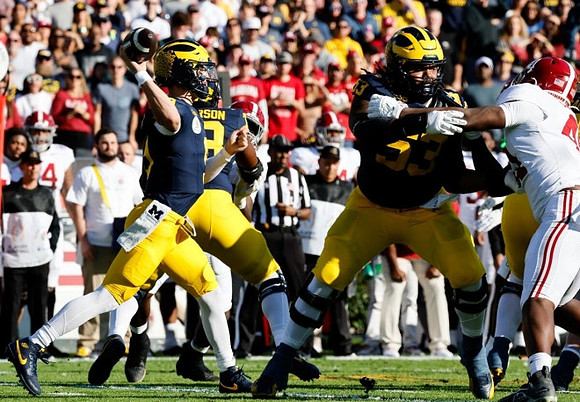 J.J. McCarthy (9), LaDarius Henderson (73), and Trente Jones (53)