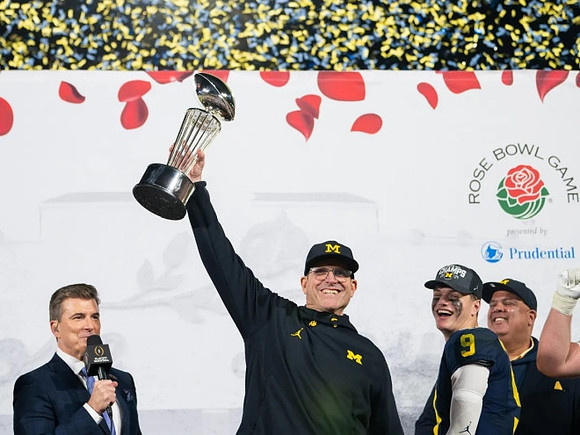 Jim Harbaugh, J.J. McCarthy (9), Warde Manuel, and Rose Bowl Trophy