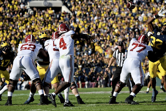 Braiden McGregor (17), Mason Graham (55), and Jaylen Harrell (32)