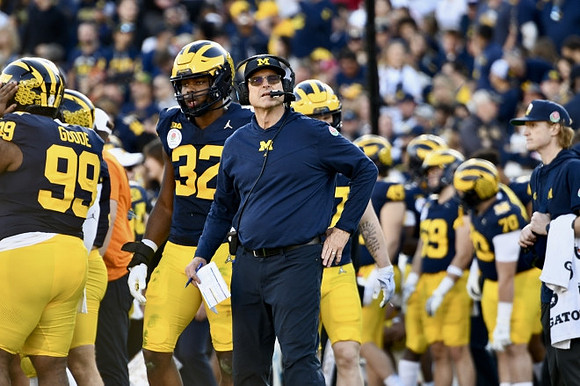 Jim Harbaugh and Michigan Team