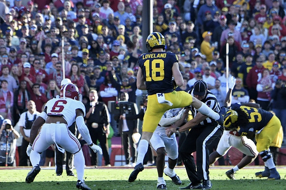 Colston Loveland (18) and Trente Jones (53)