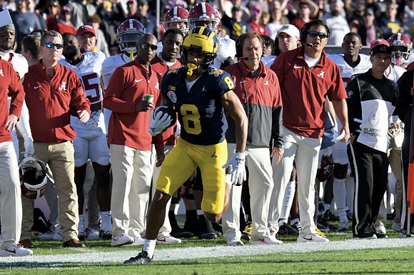 Tyler Morris (8) and Alabama Head Coach Nick Saban
