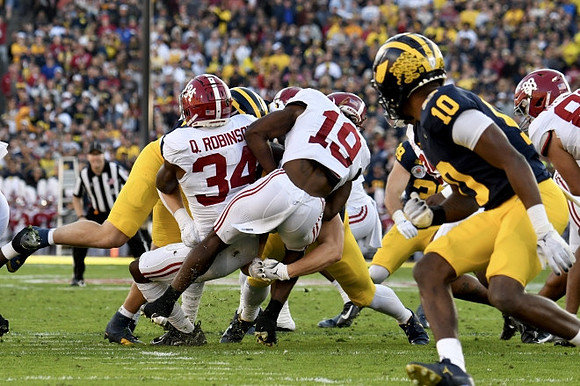 Joe Taylor (39) and Zeke Berry (10)