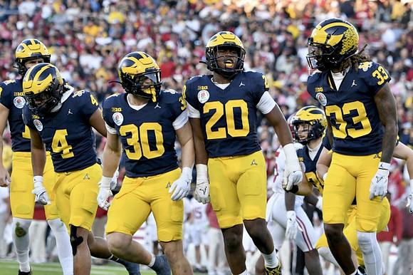 Micah Pollard (4), Jimmy Rolder (30), Jyaire Hill (20), Michael Barrett (23), and Joe Taylor (39)
