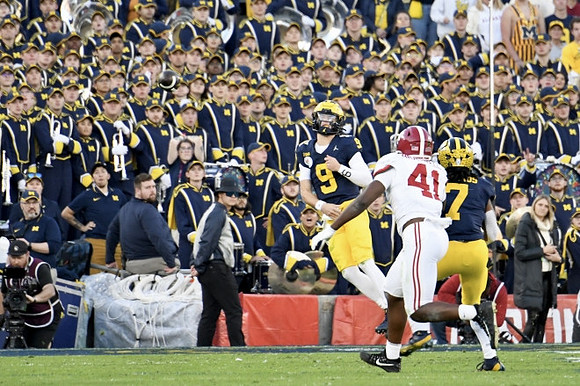 J.J. McCarthy (9) and Donovan Edwards (7)