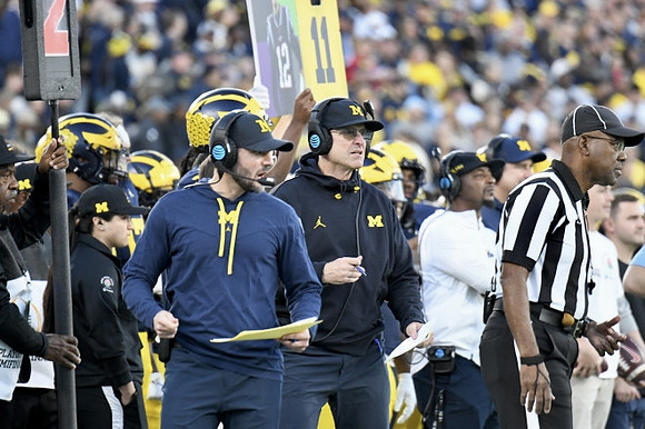 Jesse Minter and Jim Harbaugh