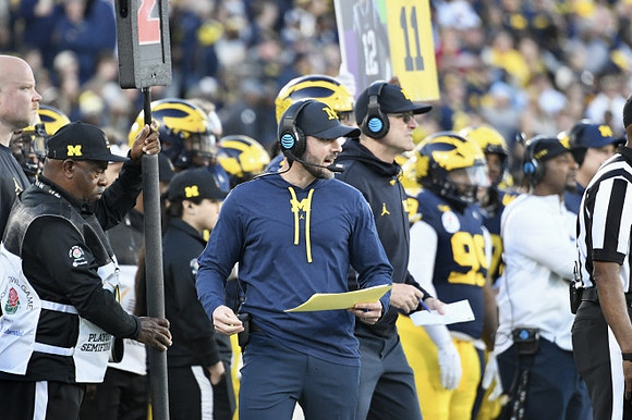 Jesse Minter and Jim Harbaugh