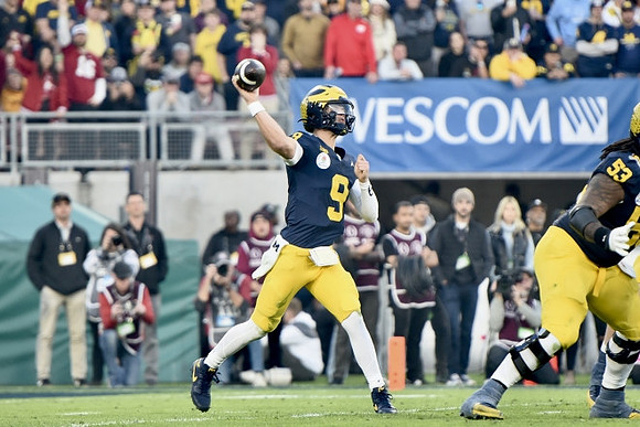 J.J. McCarthy (9) and Trente Jones (53)