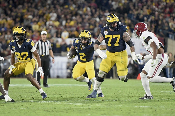 Semaj Morgan (82), Blake Corum (2), and Trevor Keegan (77)