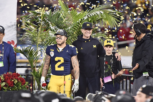 Blake Corum (2) and Jim Harbaugh