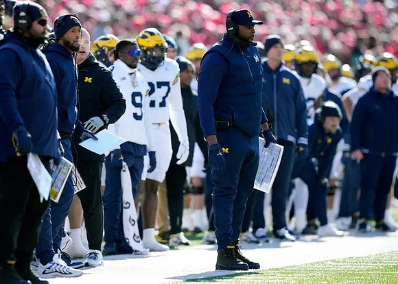 Sherrone Moore and Michigan Team