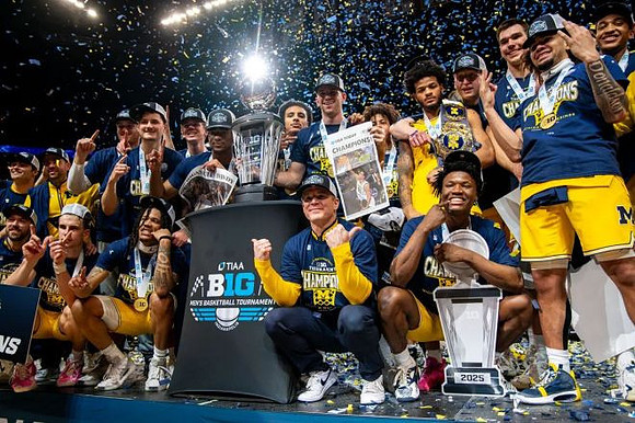 Dusty May, Michigan Team, and Big Ten Tournament Championship Trophy