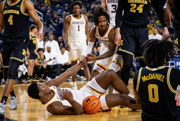 Nimari Burnett (4), Youssef Khayat (24), and Dug McDaniel (0)