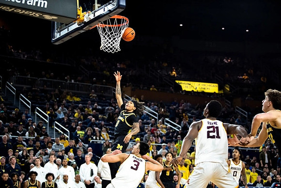 Dug McDaniel (0), Terrance Williams II (5), and Will Tschetter (42)