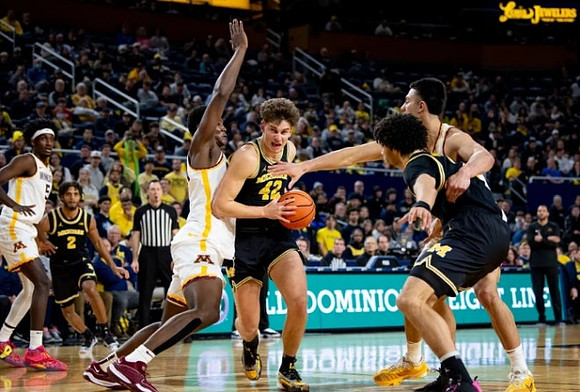 Tray Jackson (2), Will Tschetter (42), and Olivier Nkamhoua (13)