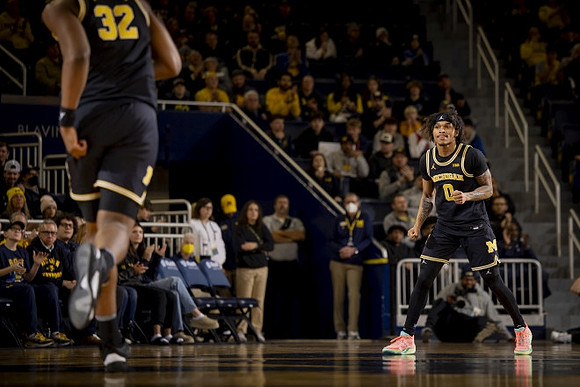 Tarris Reed Jr. (32) and Dug McDaniel (0)