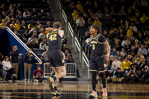 Will Tschetter (42) and Dug McDaniel (0)