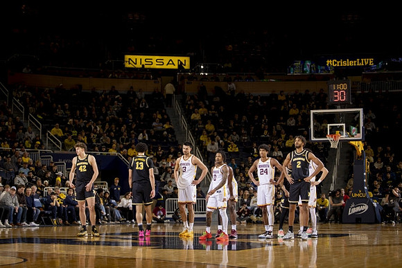 Will Tschetter (42), Olivier Nkamhoua (13), and Tray Jackson (2)