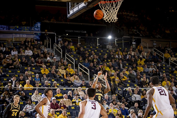 Youssef Khayat (24) and Dug McDaniel (0)