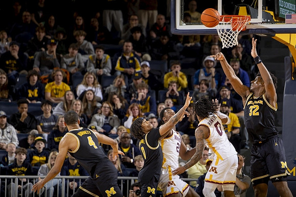 Nimari Burnett (4), Dug McDaniel (0), and Tarris Reed Jr. (32)