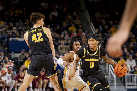 Will Tschetter (42) and Dug McDaniel (0)