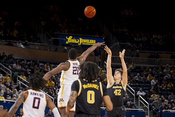Dug McDaniel (0) and Will Tschetter (42)