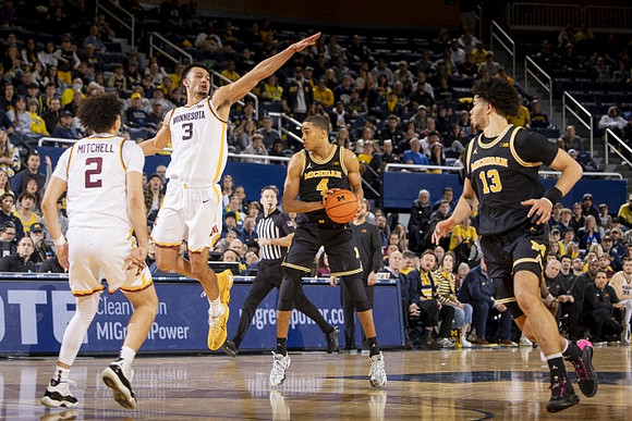 Nimari Burnett (4) and Olivier Nkamhoua (13)