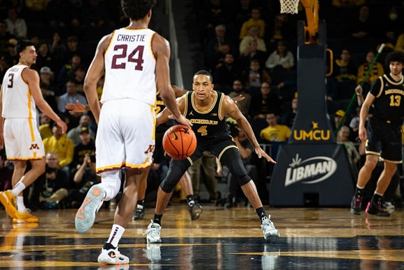 Nimari Burnett (4) and Olivier Nkamhoua (13)