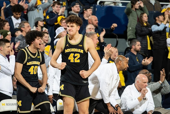 George Washington III (40), Will Tschetter (42), Saddi Washington, and Phil Martelli