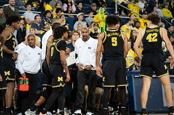 Saddi Washington and Michigan Team