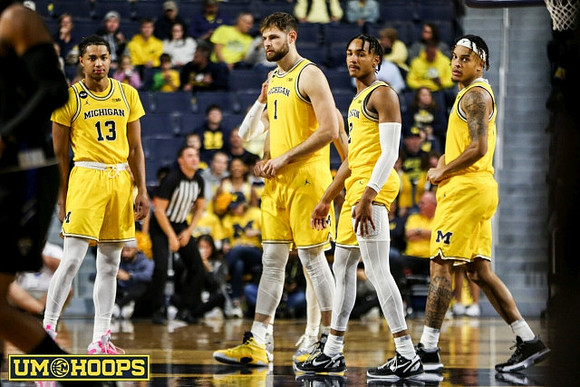Jett Howard (13), Hunter Dickinson (1), Kobe Bufkin (2), and Terrance Williams II (5)
