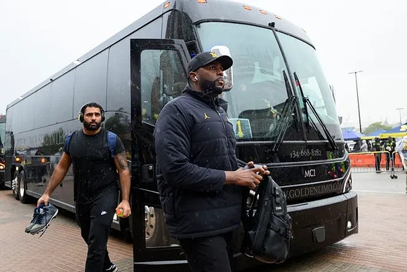 Giovanni El-Hadi (58) and Sherrone Moore
