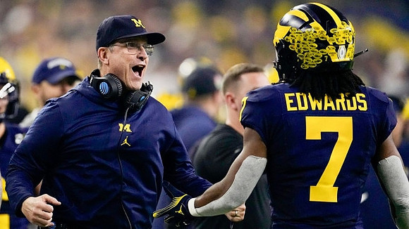 Jim Harbaugh and Donovan Edwards (7)