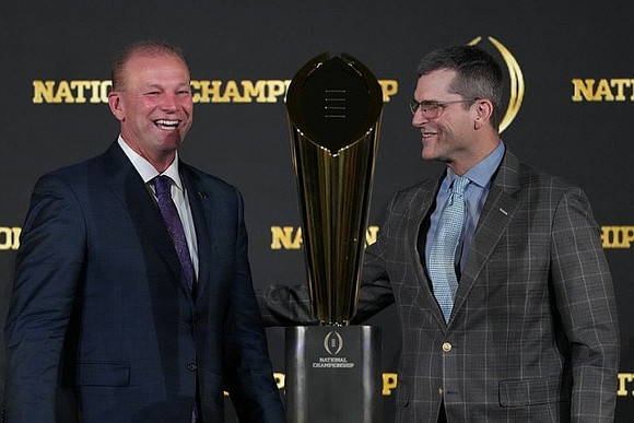 Washington Head Coach Kalen DeBoer, Jim Harbaugh, and National Championship Trophy