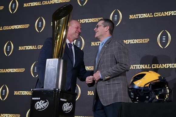 Washington Head Coach Kalen DeBoer, Jim Harbaugh, and National Championship Trophy