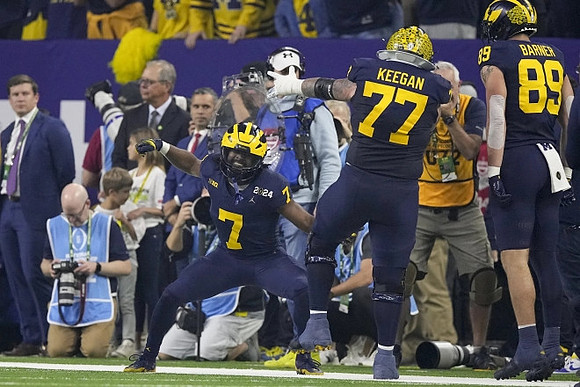 Donovan Edwards (7), Trevor Keegan (77), and AJ Barner (89)