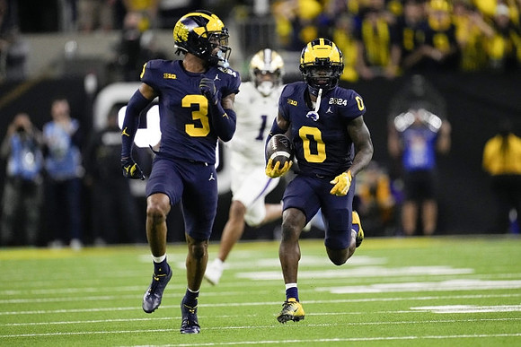 Keon Sabb (3) and Mike Sainristil (0)