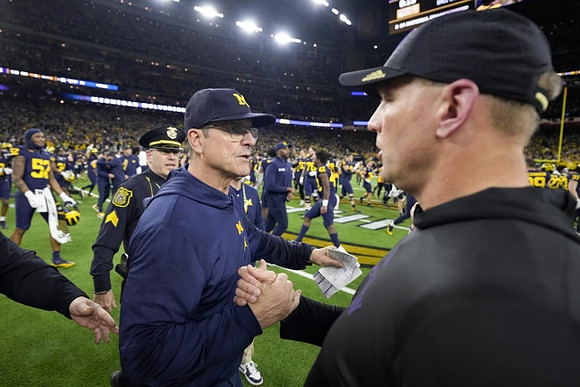 Jim Harbaugh and Washington Head Coach Kalen DeBoer
