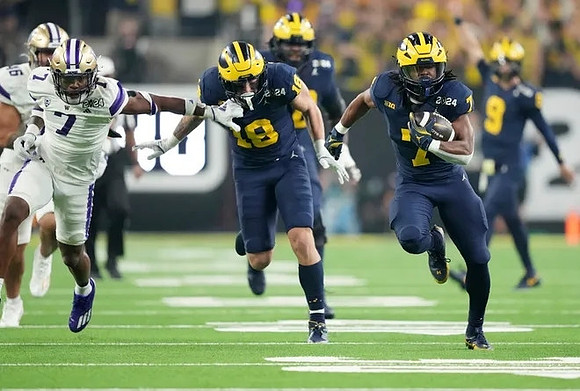 Colston Loveland (18), J.J. McCarthy (9), and Donovan Edwards (7)