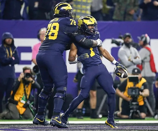 Myles Hinton (78) and Donovan Edwards (7)