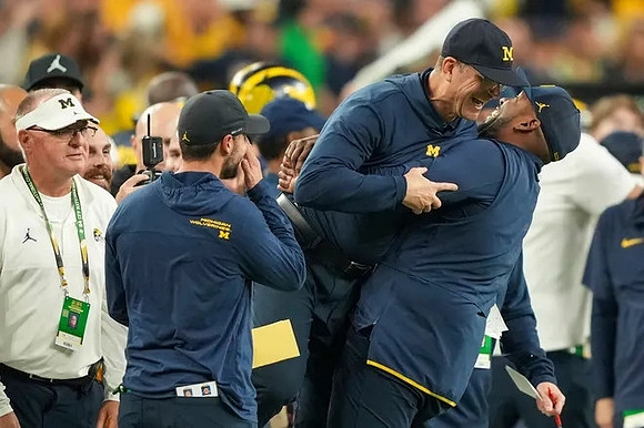 Jesse Minter, Jim Harbaugh, and Sherrone Moore