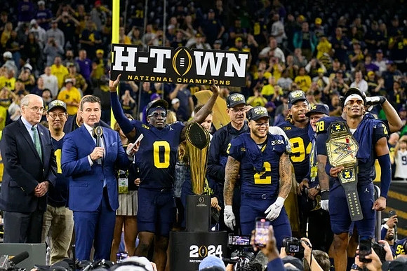 UofM President Santa Ono, Mike Sainristil (0), Jim Harbaugh, Blake Corum (2), J.J. McCarthy (9), Kris Jenkins (94), and Will Johnson (2)